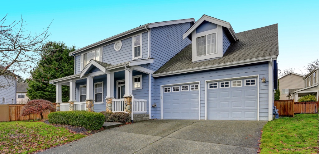 Modern Craftsman Home with Stone Pillars and Sky Blue Siding Curb Appeal.jpg